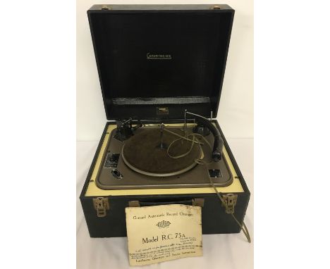 A vintage Garrard Automatic Record Changer "Convertogram", model RC 75A. In black crocodile skin effect case, with lift up li