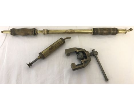 Three items of vintage metal ware. Comprising: a brass sprayer, a classic car grease gun and an ex-BT G599 flaring tool. 