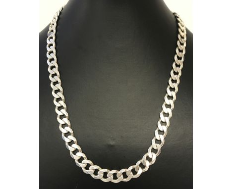A heavy curb chain necklace approx. 18 inches long. Claps and fixing marked 925 with scales mark.  Total weight approx. 67.8g