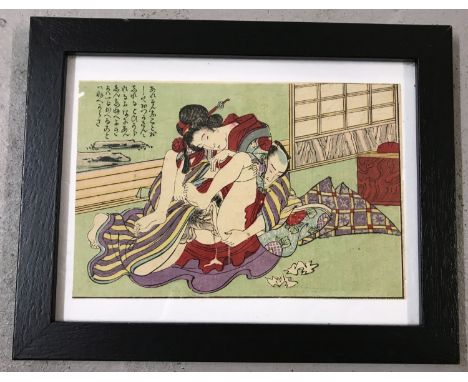A framed and glazed antique Japanese Shunga woodblock erotic print of the Edo period, c. 1850. Depicting a man an woman in er