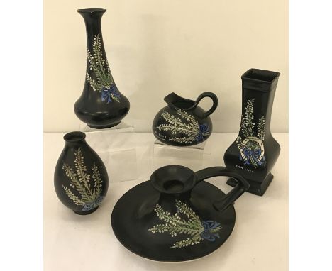 5 pieces of black painted ceramics by Shelley with white heather decorated to all. Comprising: 3 vases of different shapes an