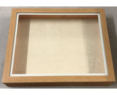A large modern handmade table-top display case. In light wood with framed glass lid and cream velvet lining. Approx. 57 x 46 