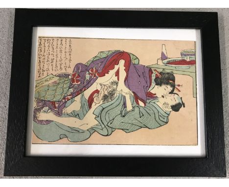 A framed and glazed antique Japanese Shunga woodblock erotic print of the Edo period, c. 1850. Depicting a man and woman in e