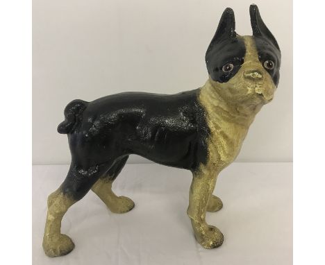 A vintage painted, heavy cast iron figurine of a French Bulldog.  Approx. 23cm tall.