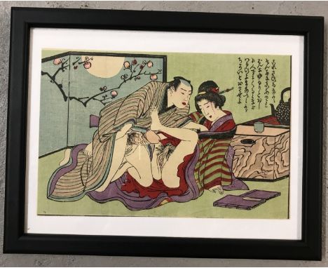 A framed and glazed antique Japanese Shunga woodblock erotic print of the Edo period, c. 1850. Depicting a man and woman in e