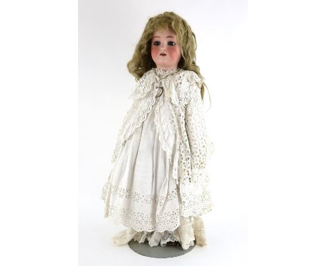 Simon and Halbig bisque headed doll stamped also K and R, sleeping blue eyes and open mouth with four teeth, 60cm high,Condit