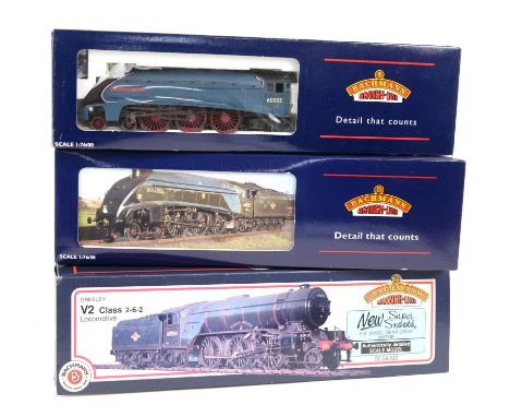 Three Bachmann 00 gauge locomotives and tenders, comprising 'Woodcock' BR green, 31-558 'Coldstreamer', and 'Andrew K McCosh'