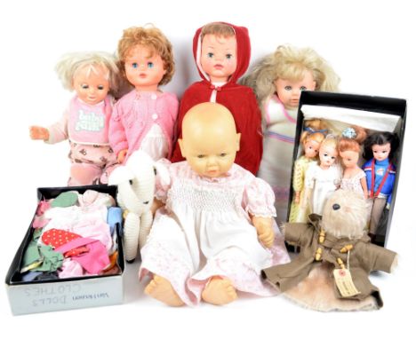 REVISED ESTIMATE Two Sindy dolls, marked to the back of the head, two others similar, five other dolls, Paddington glove pupp