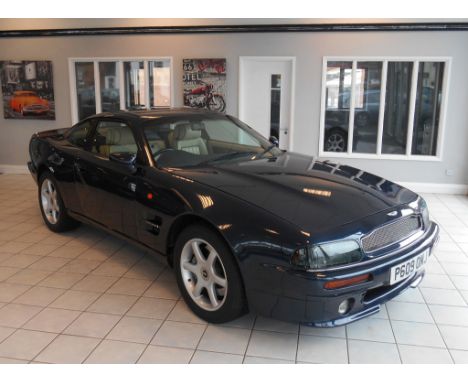 A 1997 Aston Martin V8 coupé, registration number P609 OMJ, chassis number SCFDAM2S2TBR79017, engine number 95/79017/A, Royal