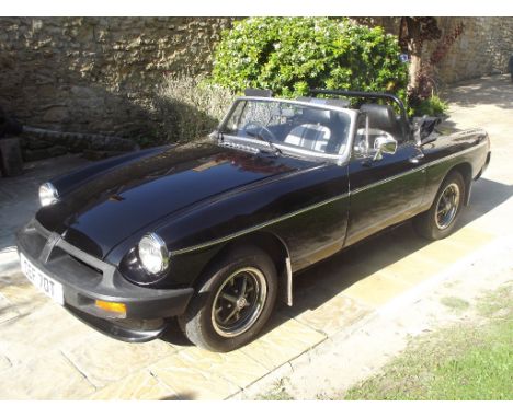 A 1979 MG B roadster, registration number CEF 70T, chassis number GHN5-49056G, engine number 31019, black. This manual overdr