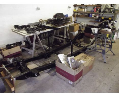 A 1953 MG TD restoration project, registration number MKV 828, chassis number TD/28408, engine number XPAG/TD2/28446, maroon.