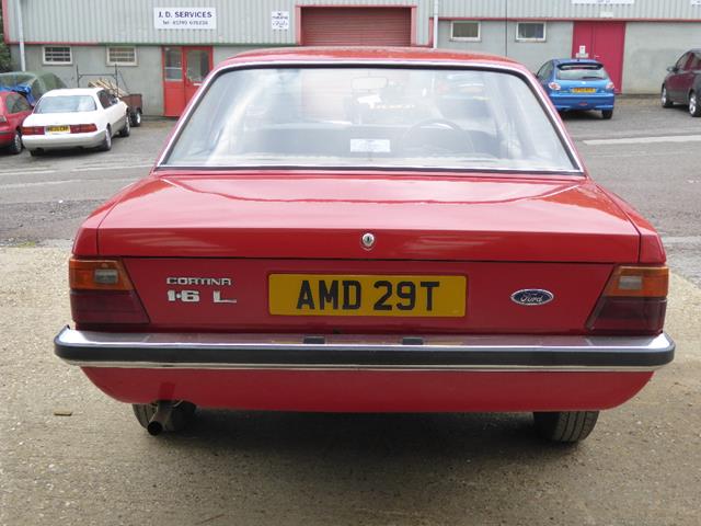 A 1979 Ford Cortina Mk IV 1.6 litre, registration number AMD 29T, red ...