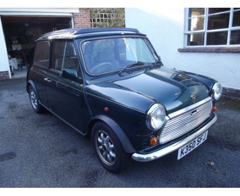 A 1992 Rover Mini British Open Classic, registration number K350 SFJ, green. With 31,500 miles from new, this limited edition