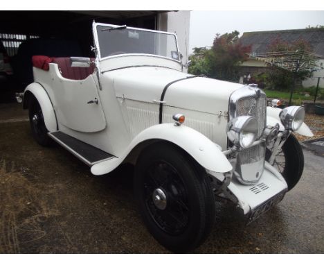 A 1934 Morris Eight Special, registration number 514 YUD, chassis number E1617, engine number 266, white. This delightful Spe