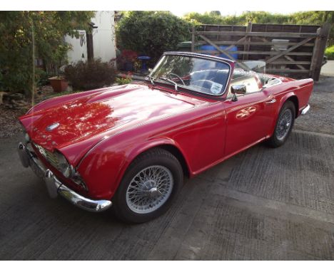 A 1962 Triumph TR4, registration number 64 XPH, chassis number CT/6366-O, engine number CT/6462E, red. New for 1961 the TR4 h