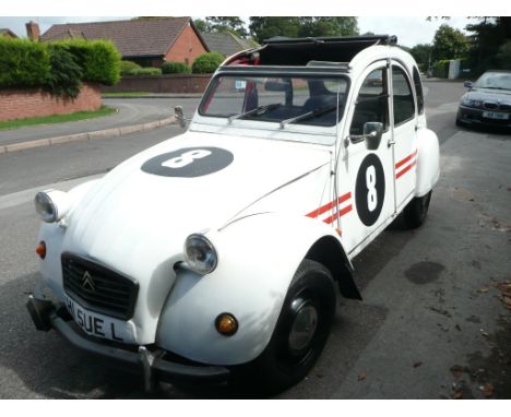 A 1990 Citroen 2CV6 Special, registration number H15 UEL (H1 5UE L), white. Repainted white for the Rosbifs & Snails du Solei