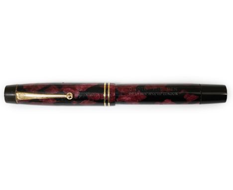 A De La Rue Onoto black and red marble piston filler with 14ct. gold No.4 nibPLEASE NOTE:- Prospective buyers are strongly ad