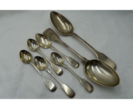 Five Victorian silver teaspoons of fiddle back form bearing monograms to terminals, a Georgian silver table spoon of fiddle b