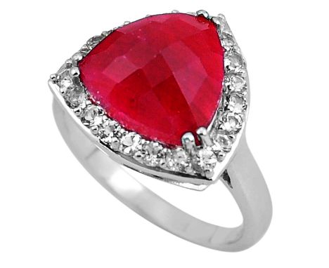A 925 silver ring set with faceted cut ruby and white topaz, (R.5).