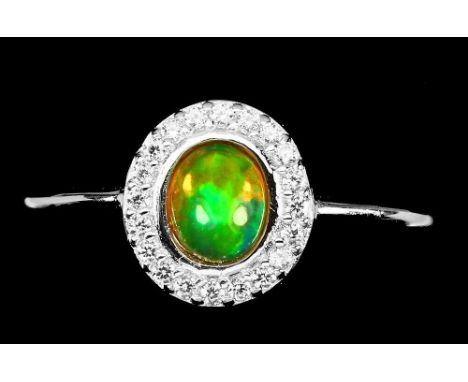 A 925 silver  cluster ring set with a cabochon cut opal and white stones, (K).