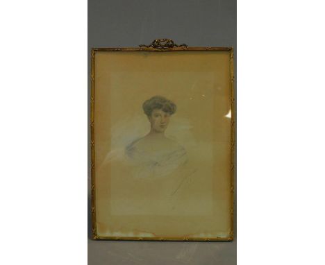 An early 20th century pencil and watercolour portrait in gilt metal easel frame. 30x21cm 