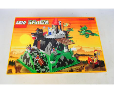 Lego - A boxed 1993 Lego 'System' #6082 Fire Breathing Fortress 'Carreg Castle'. The set is open and has signs of play wear a