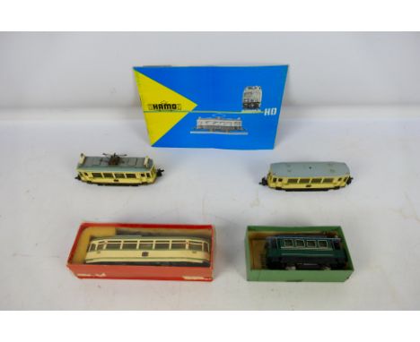 Hamo - A fleet of four HO gauge predominately motorised model trams by Hamo. Lot consists of unboxed Hamo K150 single tractio