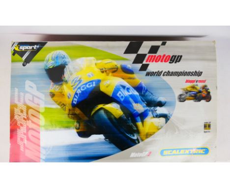 Scalextric - A boxed 1/18 scale Moto GP World Championship #C5001. Item appears good with signs of use. Instructions included