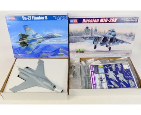 Trumpeter - Two boxed 1:48 scale plastic military model aircraft kits from Trumpeter. Lot consists of #81711 Su-27 Flanker B;