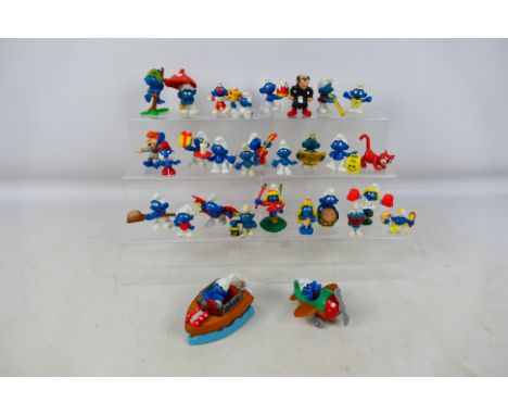 Peyo - Schleich - An unboxed collection of approximately 30 vintage Peyo / Schleich Smurf figures, including Baby Smurf (Butt