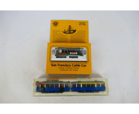 Bachmann - Liliput - Two boxed HO gauge motorised trolley cars. Lot consists of Liliput 2-Car Tram in blue & cream; together 