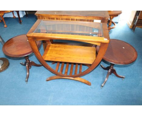 A modern glass topped table and a pair of reproduction tripod tables