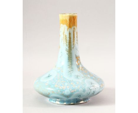 AN UNUSUAL GLAZED CERAMIC VASE, 22cm high.