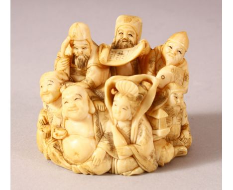 A FINE JAPANESE MEIJI PERIOD CARVED IVORY OKIMONO LARGE NETSUKE -  OF LUCKY GODS - one piece and carved depicting the lucky g