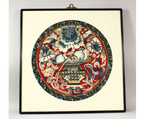 A GOOD CHINESE CIRCULAR SILK EMBROIDERED CIRCULAR PICTURE, depicting an urn of flowers with gilt thread detail, image 49cm di