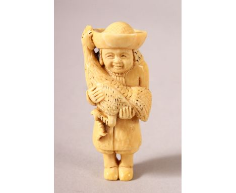 A LARGER JAPANESE MEIJI PERIOD CARVED IVORY NETSUKE - MAN AND PEACOCK - the man stood holding in his arms a peacock, signed t