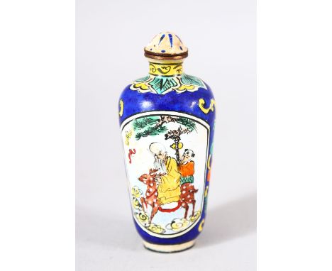 A CHINESE ENAMEL SNUFF BOTTLE - the bottle painted to depict shou lao and his deer holding a staff with peach, the verso with