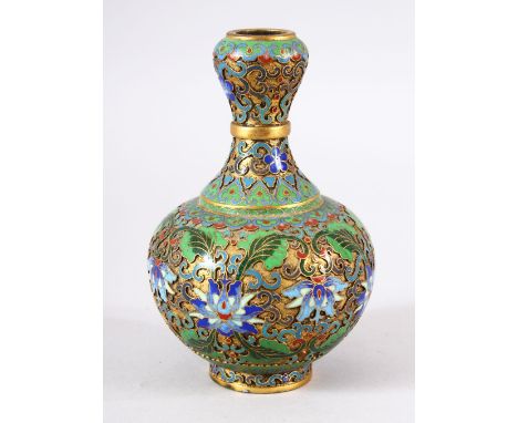 A 19TH CENTURY CHINESE CHAMPLEVE ENAMEL / CLOISONNE BOTTLE VASE , Of garlic head form, decorated with raised lotus and foliag