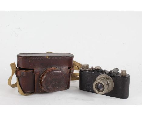 Leica I Model C Ernst Leitz Wetzlar camera, in black, with a Leitz Elmar f/3.5 50mm lens, No. 123152, housed in a leather Lei