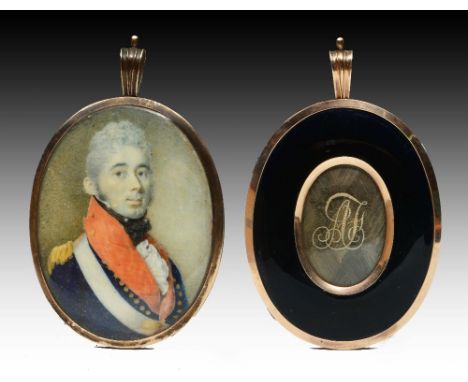 A GEORGE III OVAL MINIATURE PORTRAIT of an officer in uniform with memorial monogrammed hair panel verso and in pinchbeck fra