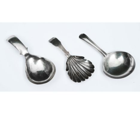 A GEORGE III SILVER CADDY SPOON with a plain circular bowl and reeded handle, 8.5cm long, London 1804 by Thomas Wallis II, a 