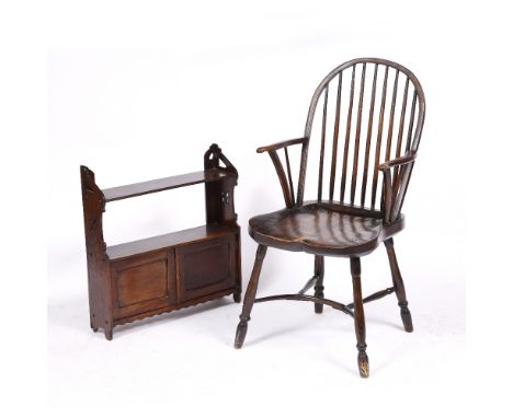 AN OLD ASH AND ELM WINDSOR CHAIR with stick back and crinoline stretcher, 44cm wide; and a Victorian oak medicine cabinet wit