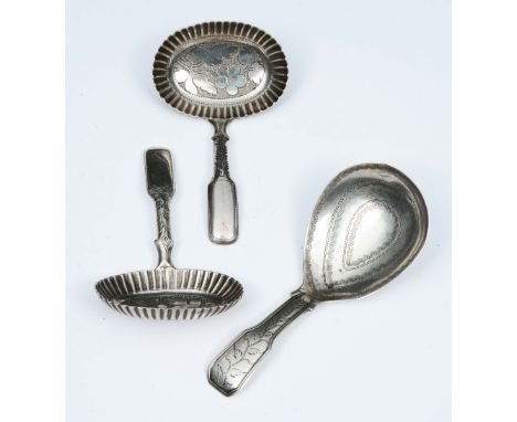 A PAIR OF GEORGE III SILVER CADDY SPOONS with oval bowls, engraved with leaves, fluted sides and hollow handles, Birmingham 1