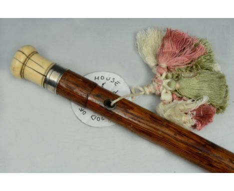 AN AMERICAN WALKING STICK said to be made from wood from William Penn's house, Chester, Pennsylvania with ivory knob and silv