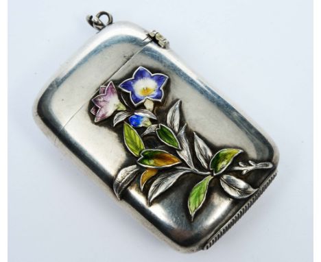 AN UNMARKED METAL VESTA CASE with polychrome enamel, butterfly and floral spray decoration, 4.5cm high