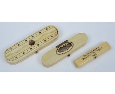 A GEORGE III IVORY AND ENAMEL NEEDLE CASE inset memorial lock of hair and bearing inscription 'Caroline Carver died 22 May 17