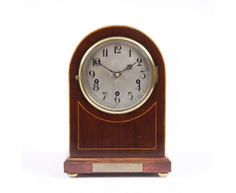 A MAHOGANY MANTEL CLOCK with boxwood line inlay, steel dial and chiming mechanism with brass presentation  plaque and ball fe