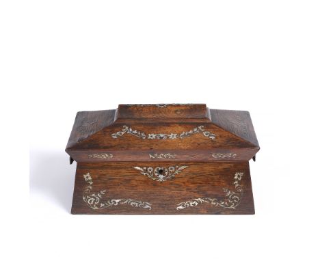 AN EARLY VICTORIAN ROSEWOOD AND MOTHER OF PEARL INLAID TEA CADDY of sarcophagus form, the interior fitted with two lidded com