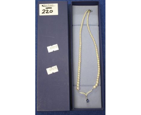 18ct white gold pear shaped tanzanite and diamond graduated pearl necklace in box.(B.P. 24% incl. VAT)