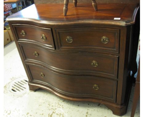 Reproduction hardwood serpentine chest of two short and two long drawers on bracket feet, by Willis and Gambier.(B.P. 24% inc